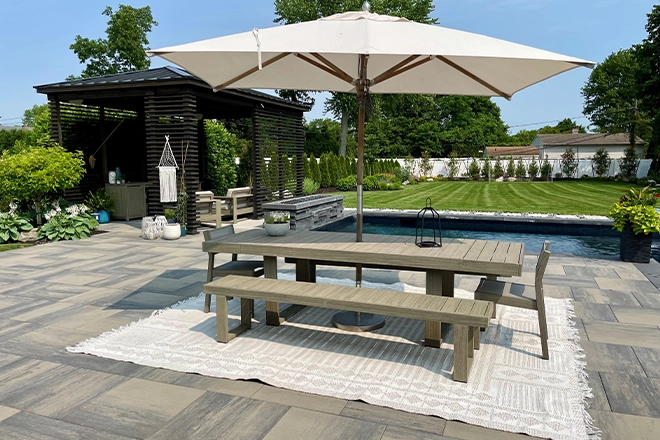High-end patio with a rug under the dining area High-end patio with a rug under the dining area