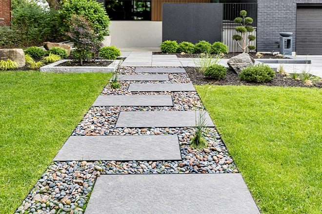 Modern stone walkway with gravel Modern stone walkway with gravel