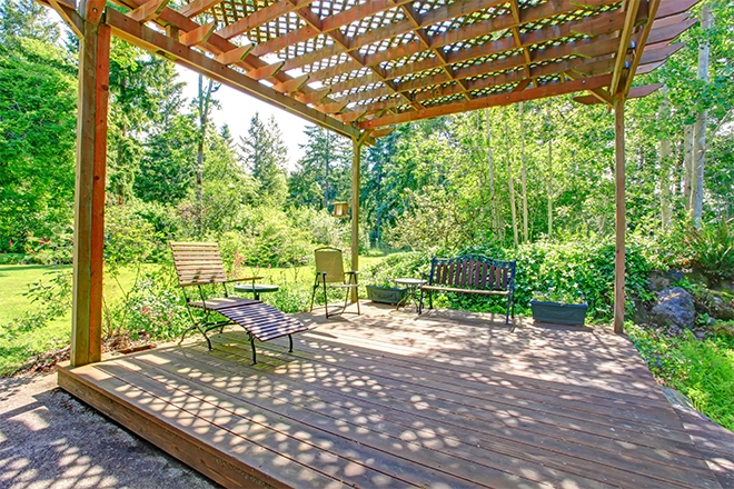 Pergola ideas include wood and plantings