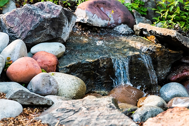 Small backyard water feature waterfall and rocks Small backyard water feature waterfall and rocks